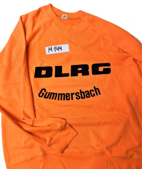 Foto der orangenen Einsatzkleidung der DLRG-Gummersbach Anfang der 1990er Jahre